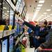 Shuming Bao browses the television section at Target on Thursday. Daniel Brenner I AnnArbor.com